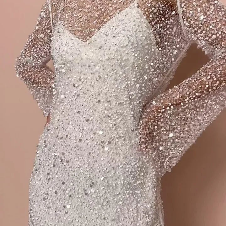 Sukienka mini z błyszczącymi cekinami i przezroczystymi rękawami - vivano - warszawa